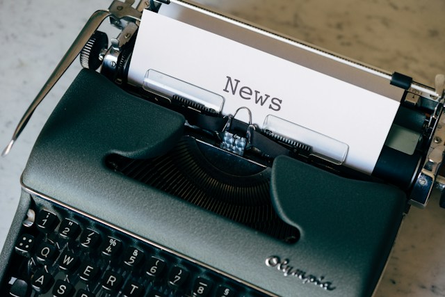 Typewriter with "News" typed at top of page