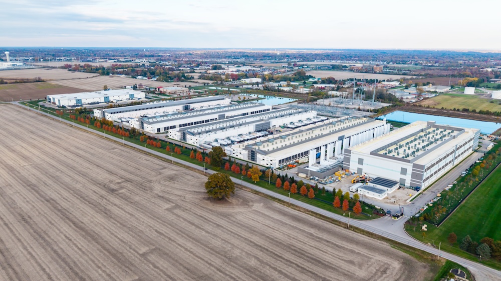 Aerial view of AI hub and Data center amid agricultural fields.